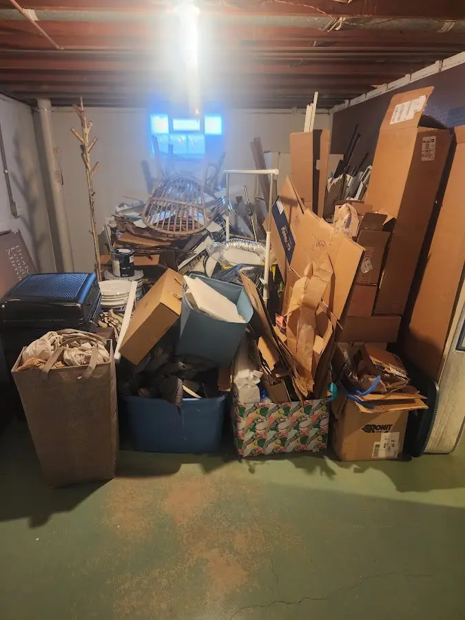 Roll-off dumpster container at job site for 20 Yard Dumpster Rental in Godley